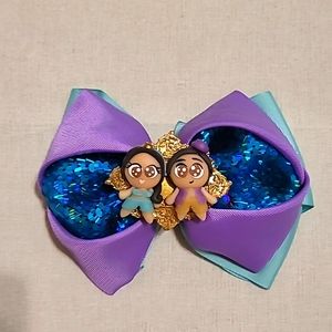 Aladdin and Princess Jazmin hand made hair bow